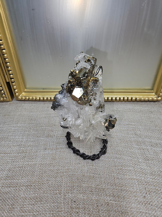 Octohedral pyrite on quartz cluster