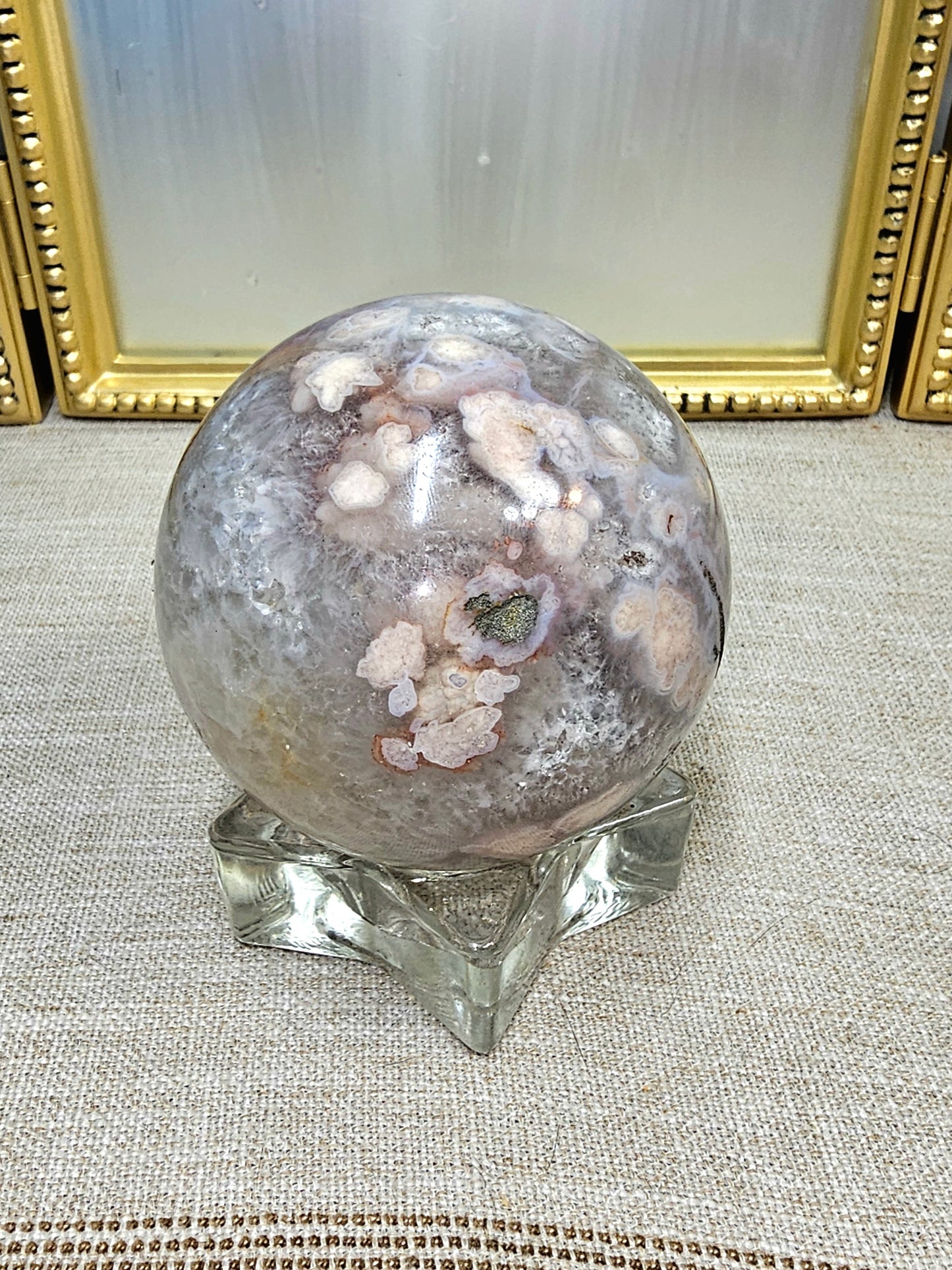 Cherry flower agate sphere with pyrite inclusion