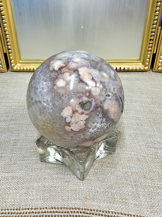 Cherry flower agate sphere with pyrite inclusion